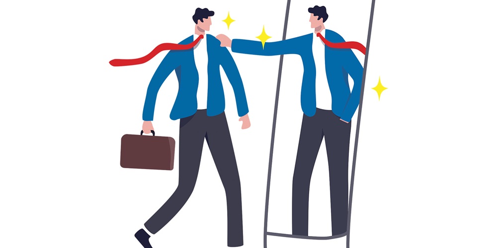 Illustration of a man's reflection reaching out to pat him on the shoulder. Header image by Shutterstock / Eamesbot.
