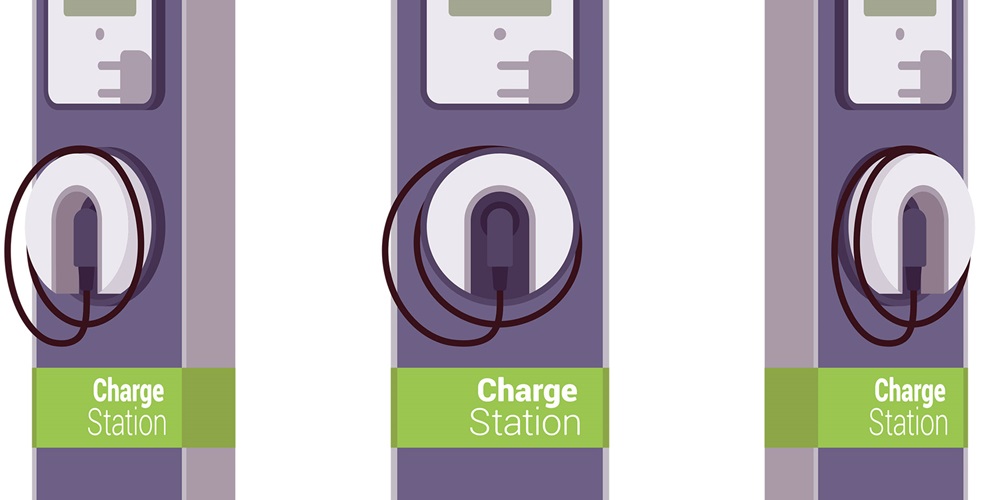 Three charging stations labeled Charge Station. Image by Shutterstock / Andrew Rybalko.