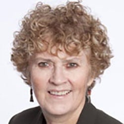 A woman, Susan Casey, smiles. Image by Susan Casey.