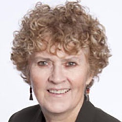 A woman, Susan Casey, smiles. Image by Susan Casey.