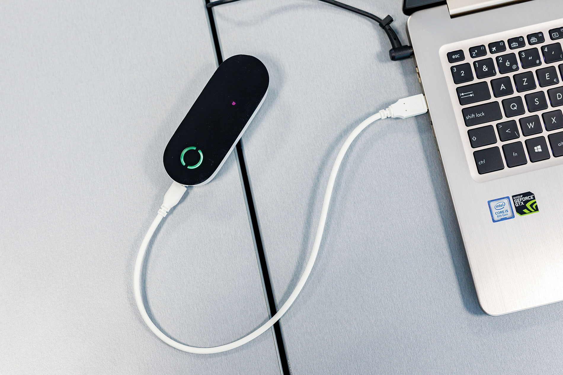 With Li-Fi, a USB access key or dongle receives the light fidelity signal, as shown here with Signify’s TruLiFi product. Courtesy of Signify