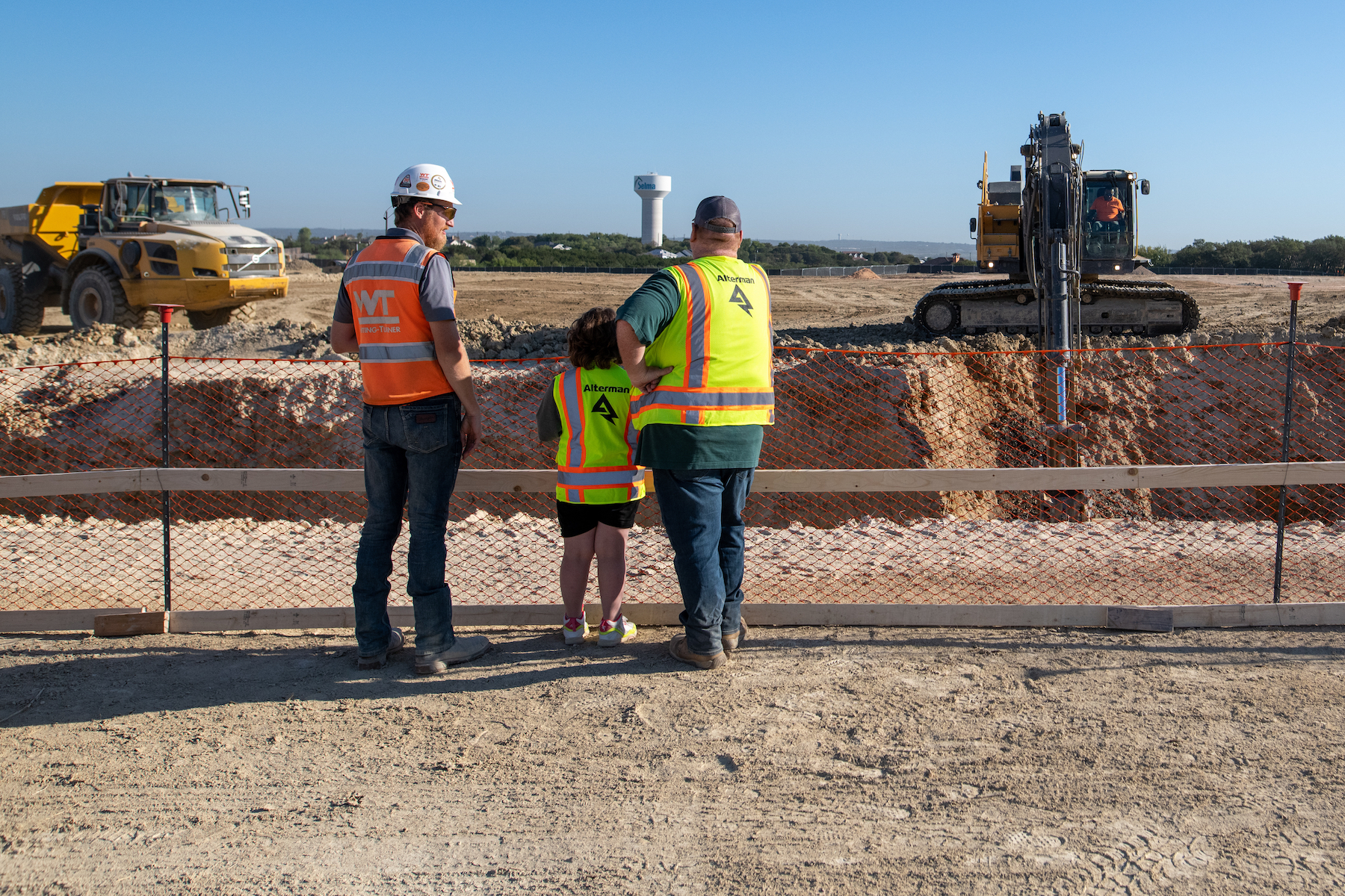 kid watching construction