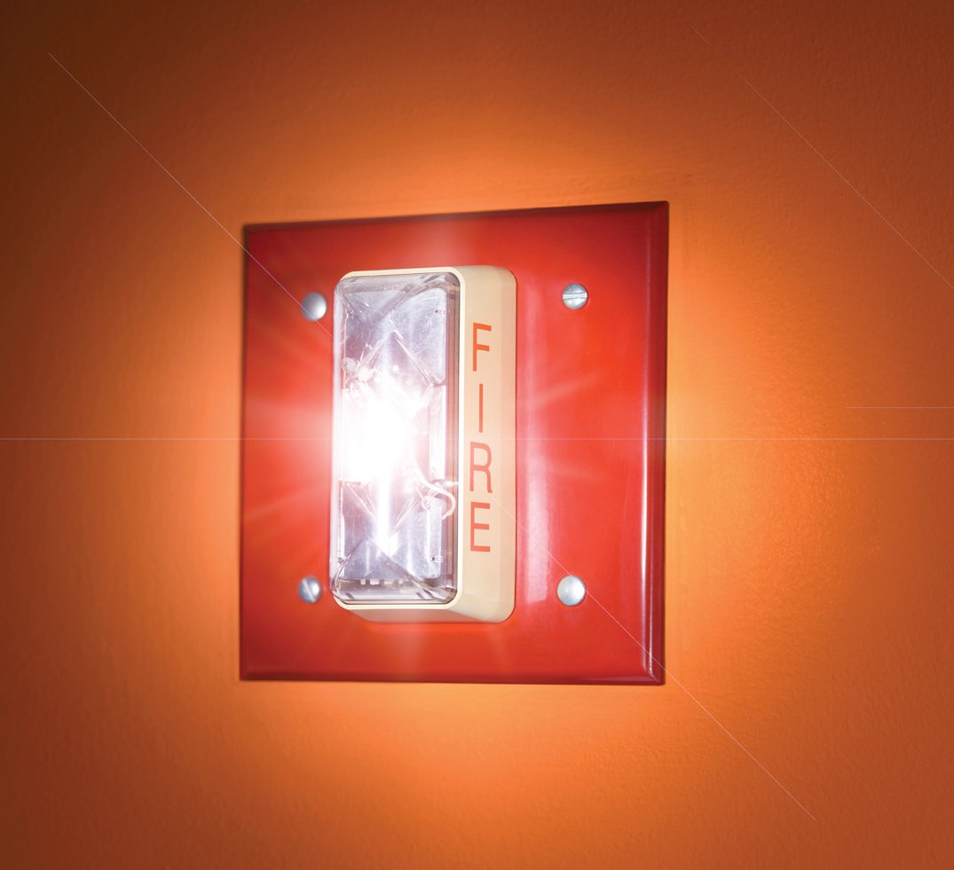 Fire alarm strobe requirements - fire alarm strobe light positioned based on NFPA 72 code requirements