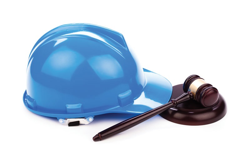 Blue construction helmet and gavel