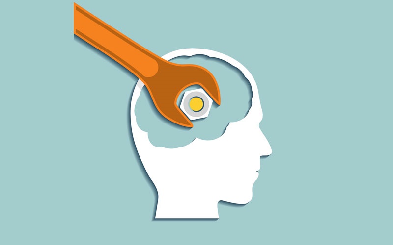 Illustration of head with wrench tightening a bolt in the brain