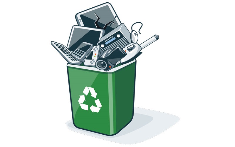 Green recycling bin with electronics in it