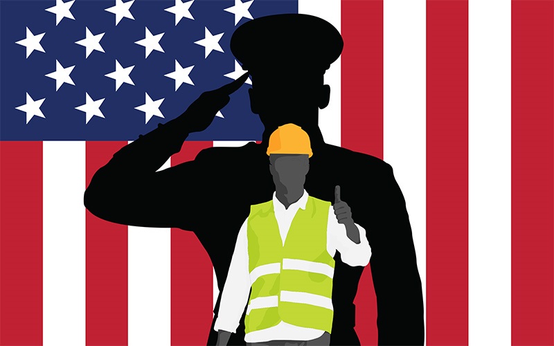 person in front of American flag