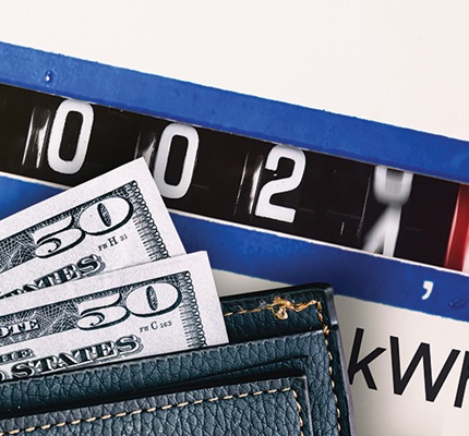 Do the Math First: Rising electricity bills raise important questions / wallet with U.S. dollars / money / electricity meter / electric meter